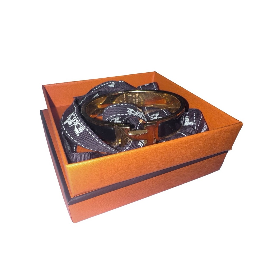 Hermes gold and black clic h bracelet